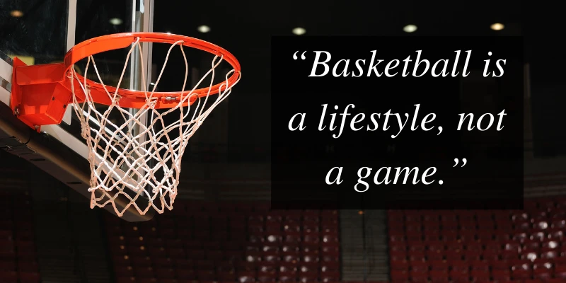 Basketball hoop in an empty arena with a quote overlay saying, “Basketball is a lifestyle, not a game,” symbolizing passion and culture.