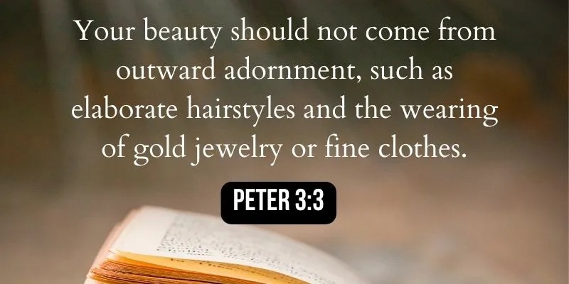 An open book with a bible quote: "Your beauty should not come from outward adornment, such as elaborate hairstyles and the wearing of gold jewelry or fine clothes.