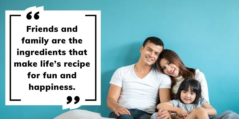 A man and woman sitting on a bed with a child and enjoying life quote is written on a white background