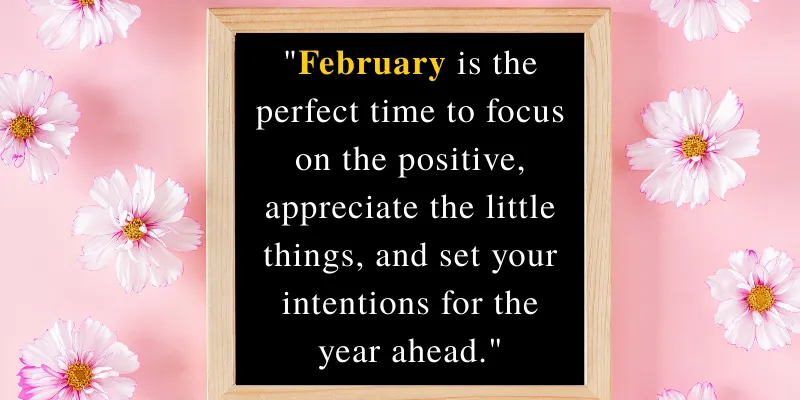 February quote on a blackboard surrounded by pink flowers, inspiring mindfulness, gratitude, and goal-setting for the year ahead