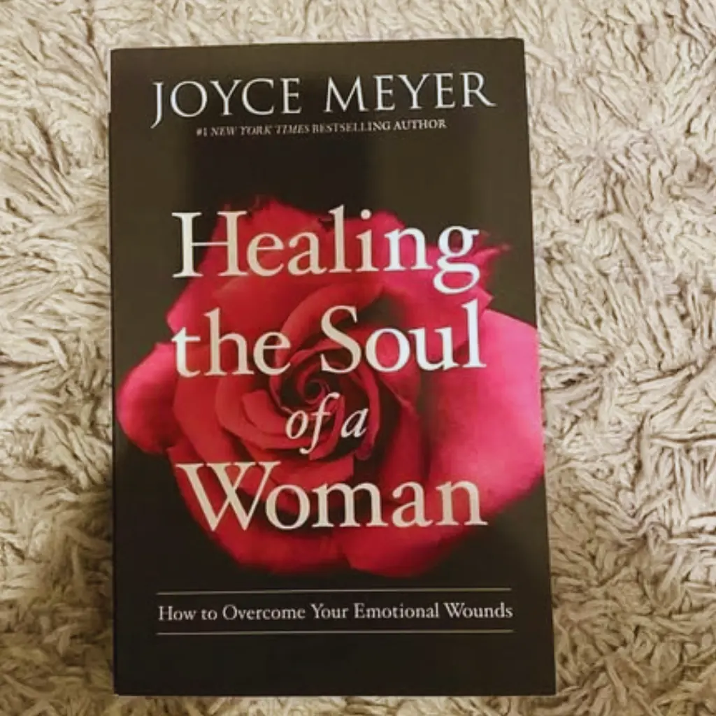 Book cover of Healing the Soul of a Woman by Joyce Meyer, offering guidance on overcoming emotional wounds