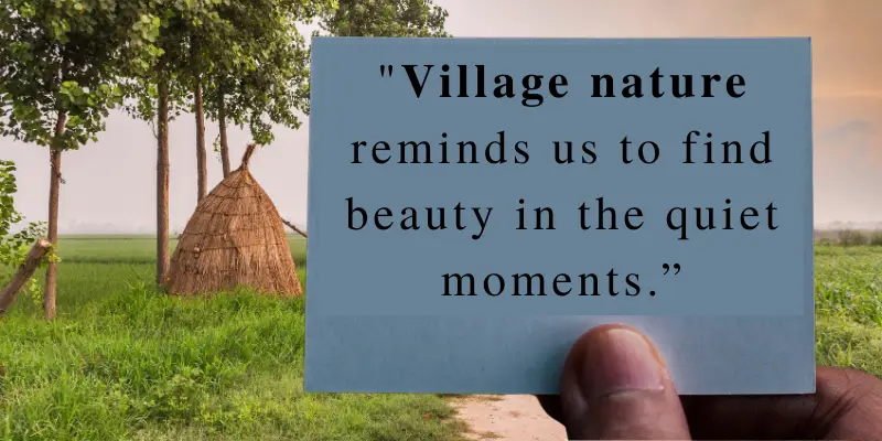 A quote about finding beauty in quiet village moments, held up on a card with a natural background